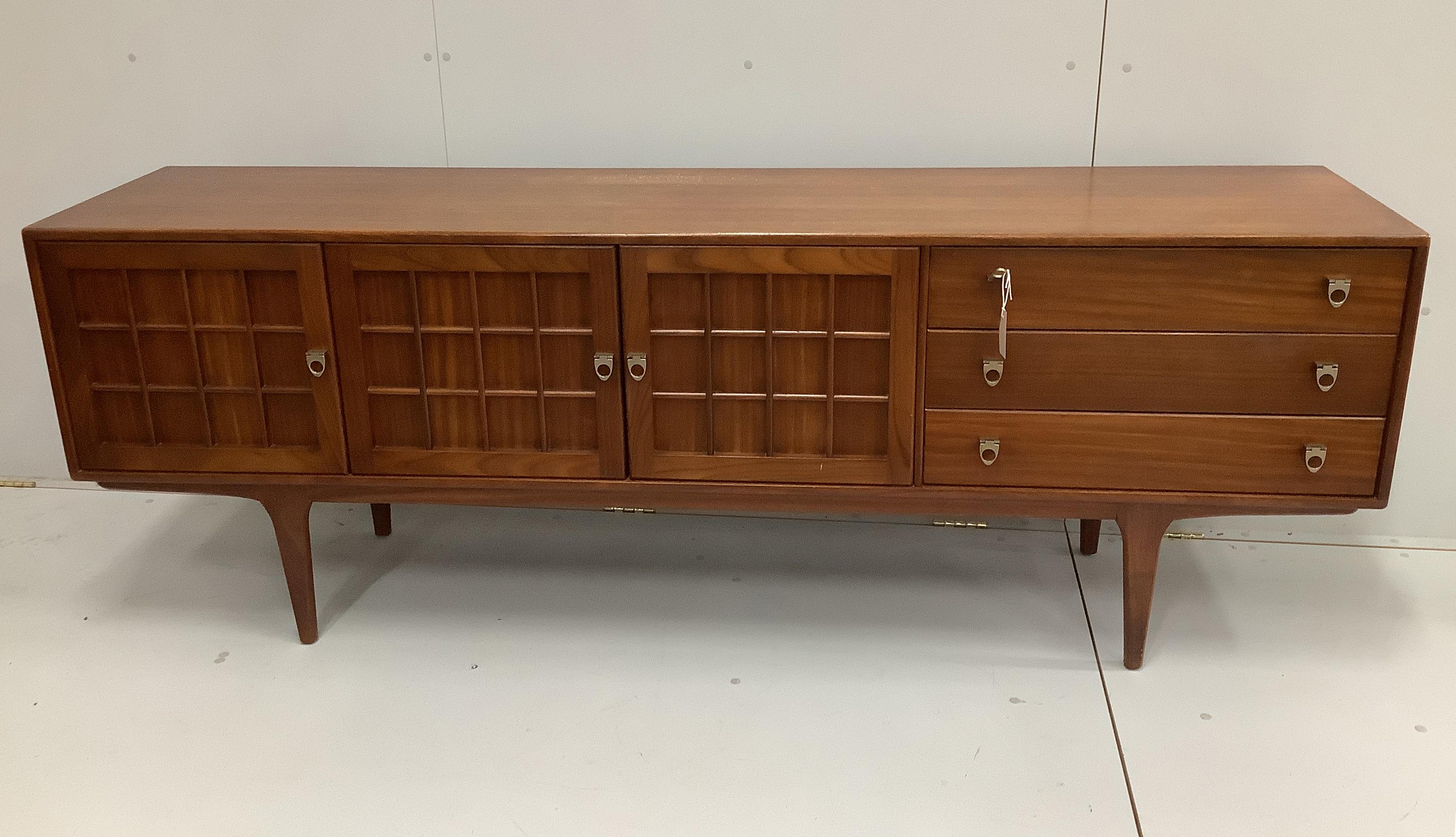 Herbert Gibbs for Younger Furniture, a mid century teak sideboard, width 205cm, depth 46cm, height 73cm